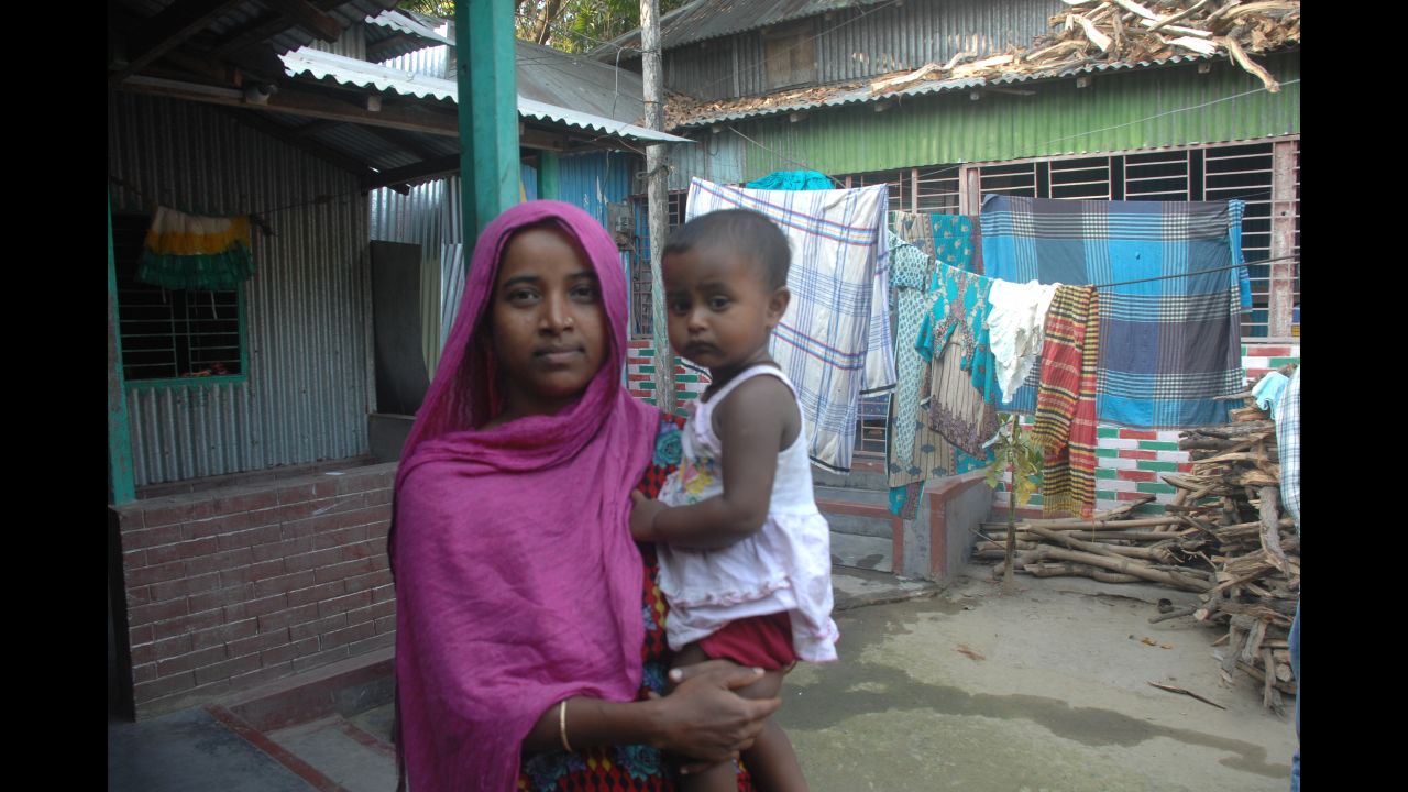 In the rural village of Mirzapur, about two hours' drive from Dhaka, researchers are exploring how the environment affects the gut health of young children, which could affect how they respond to vaccines. Lili and her 16-month-old daughter, Tithi, are participating in the study. 