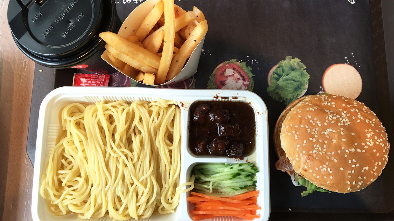 Including a glass of soda -- or hot honey pomelo tea -- and fries, the duck burger combo costs 31 yuan ($4.70). The menu also includes reformed Zhajiangmian -- traditional Beijing-style noodles with minced pork sauce. The old school noodles have been replaced with spaghetti.