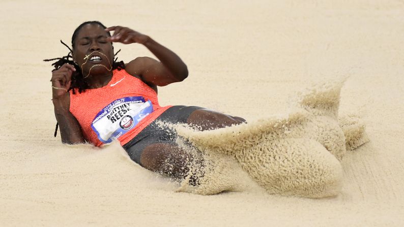Brittany Reese lands in the pit on her way to winning the women's long jump at the USA Indoor Track & Field championships in Portland, Oregon, on Saturday, March 12. 