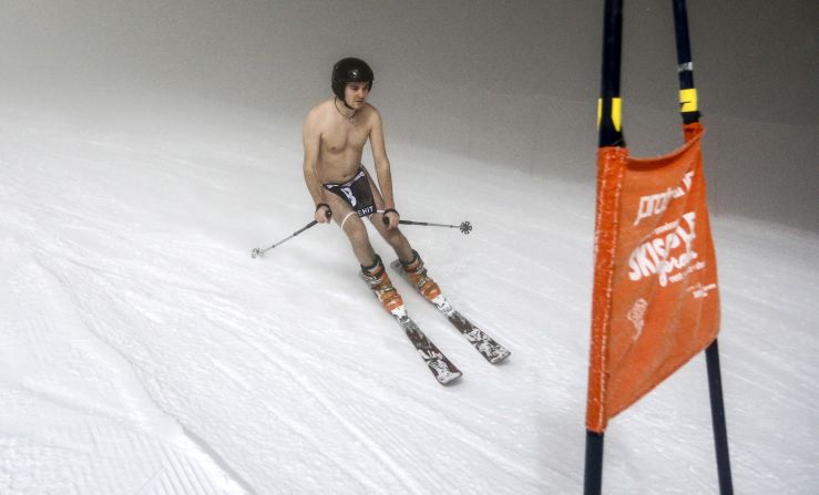 A competitor speeds down during a fun "Naked Slalom Ski Race" in a western Austrian ski resort on Saturday, March 12. 