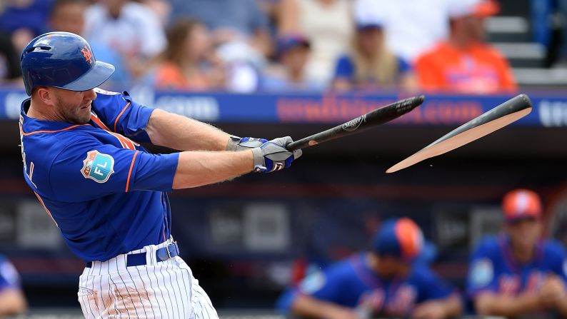 Eric Campbell of the New York Mets breaks his bat on a hit during the second inning of a spring training game against the St. Louis Cardinals on Saturday, March 12, in Port St. Lucie, Florida. <br />