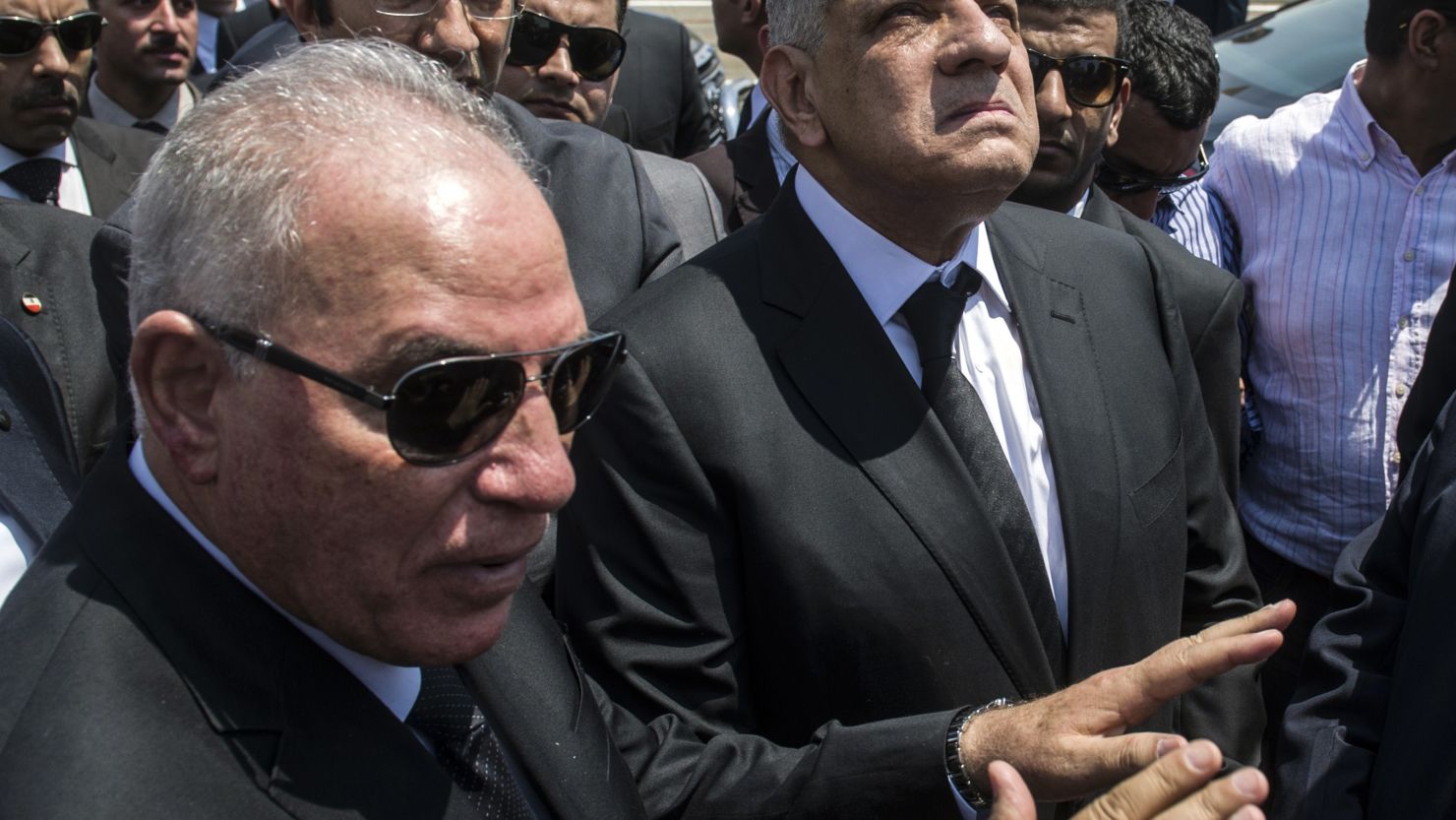 Ahmed al-Zind (L) was appointed Egypt's Justice Minister in May 2015.