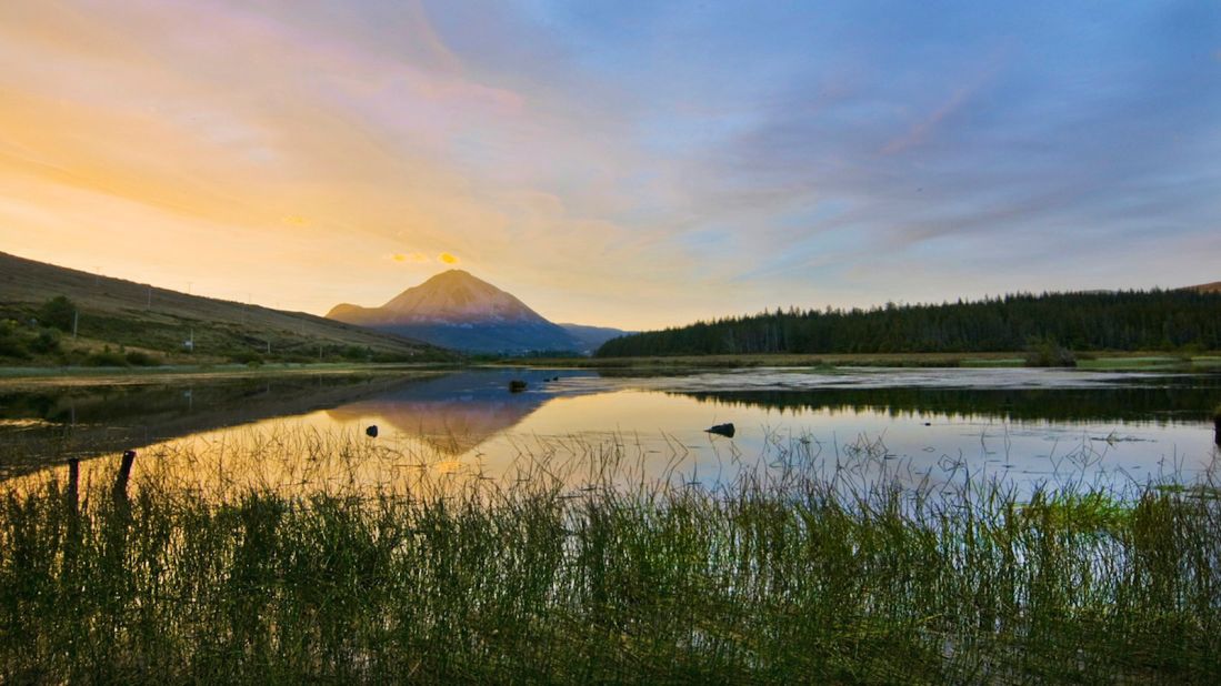 <strong>Mount Errigal (Donegal): </strong>Mount Errigal is the tallest peak in Donegal, northwest Ireland. It's renowned for the pinkish glow of its quartzite rock at sunset. 