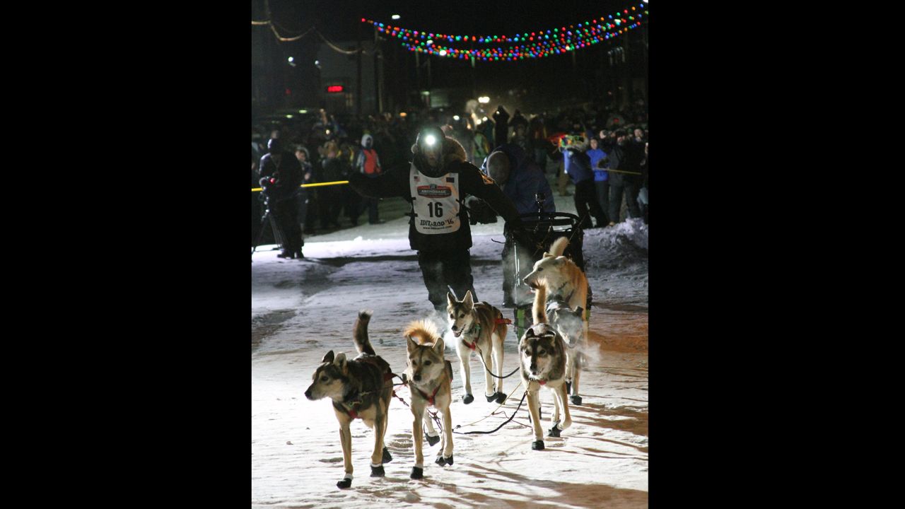 Dallas Seavey approaches the finish of the Iditarod Trail Sled Dog Race on Tuesday, March 15, in Nome, Alaska. Seavey won his third straight Iditarod, for his fourth overall title in the last five years. 