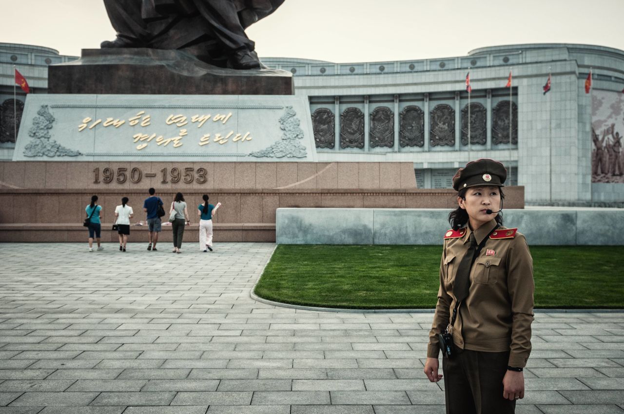 "Who's American here?" the museum guide asks. "Grab the flowers, go to the monument, bow, and lay the flowers there." Huniewicz says North Koreans told him they single-handedly defeated the U.S. in the Korean War.