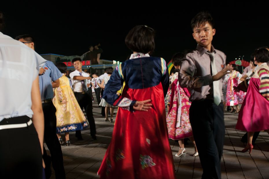 This scene was captured during a dance held to commemorate the 70th anniversary of Liberation from Japan at Pyongyang's Kim Il-sung Square.