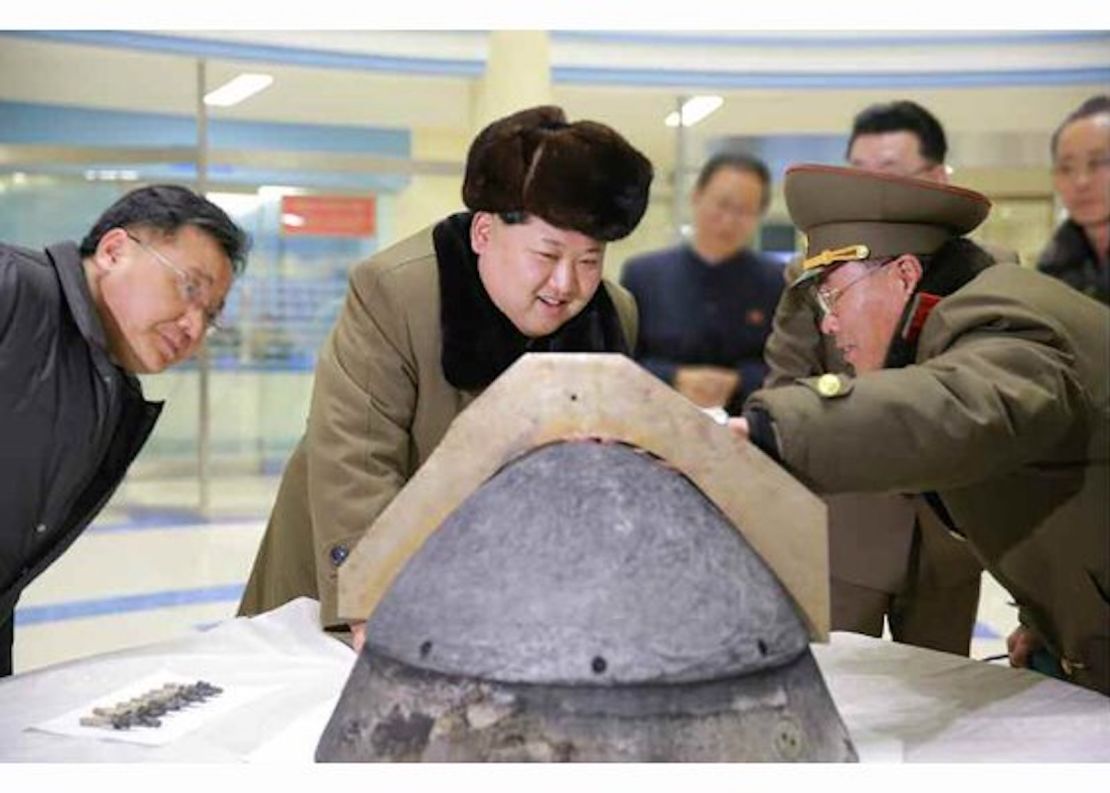 North Korean leader Kim Jung-un reviewing a ballistic rocket simulation.