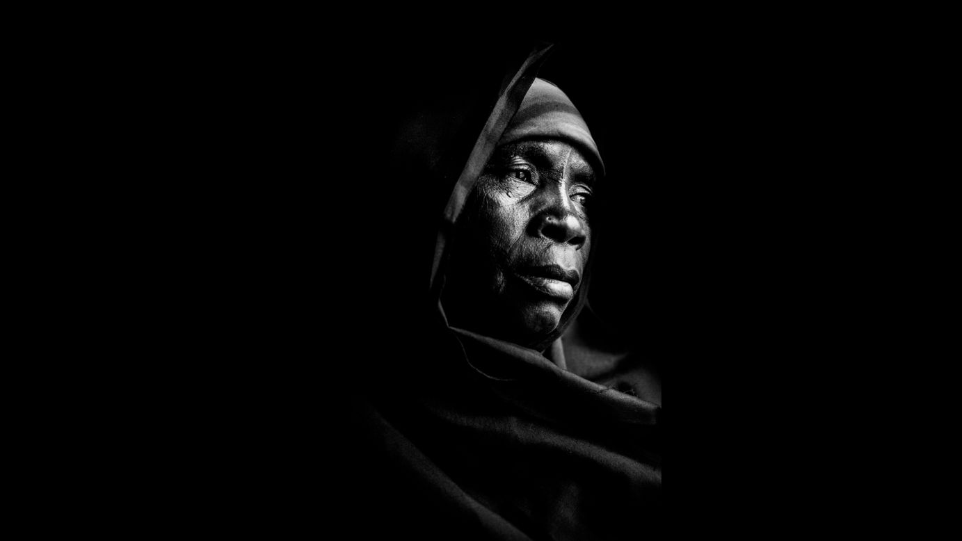 With a piece of black cloth, a few rags and a little chair, Spyra created his makeshift studio at a church compound. Salamatu Ibrahim, pictured here, spent five months in captivity. 