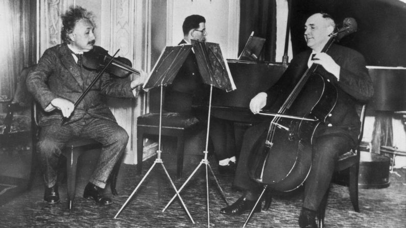 Einstein, left, plays violin aboard a German passenger ship in 1933.