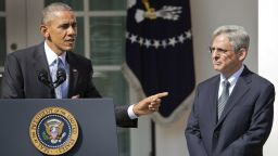 Federal appeals court judge Merrick Garland, stands with President Barack Obama as he is introduced as Obama's nominee for the Supreme Court during an announcement in the Rose Garden of the White House, in Washington, Wednesday, March 16.