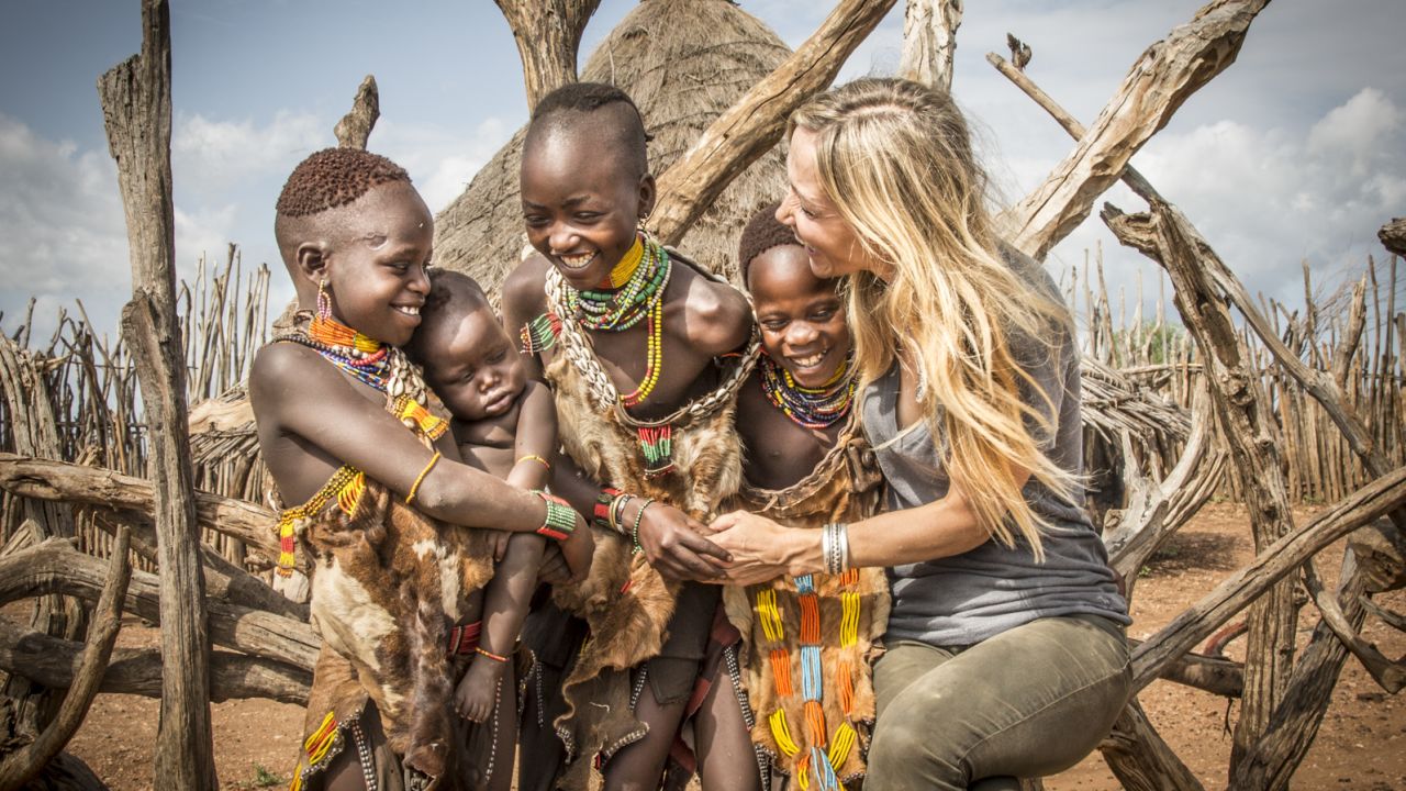 "The children are always the easiest to photograph as they love to touch, laugh and joke with me, says Seton. "These children were fascinated with my long blond hair and loved to touch it."