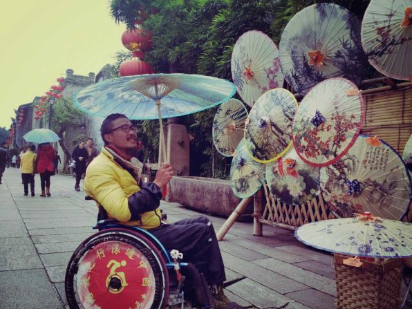 Quan Peng visits a historical neighborhood in Fuzhou, southeast China.  His final destination is Sanya, in Hainan province -- still some 1,700 kilometers away.