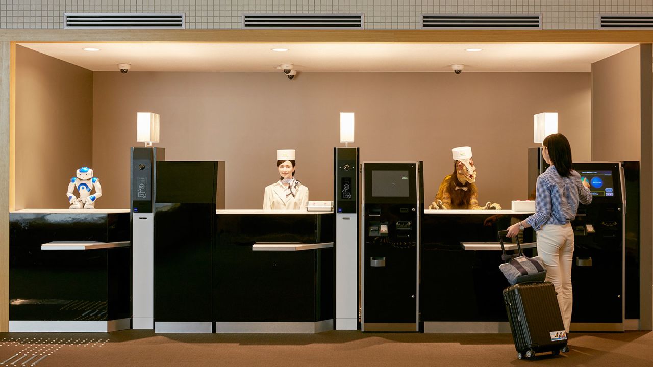 In Japan, robots turn up in unexpected places. At the five-star Henn-na Hotel in Nagasaki Prefecture, humanoid robots greet Japanese-speaking guests at reception, while English-speaking guests are met by a robotic dinosaur. Naturally.<br /><br />Droids cart luggage to the hotel's 72 rooms and clean up after you.