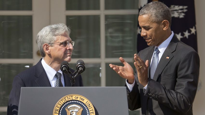 Federal appeals court judge Merrick Garland, stands with President Barack Obama as he is introduced as Obama's nominee for the Supreme Court during an announcement in the Rose Garden of the White House, in Washington, Wednesday, March 16.