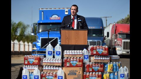 California State Assemblyman Devon Mathis speaks to members of the media after he helped secure a donation of 100,000 water bottles in September. More than 300 homes in Porterville, California, were out of running water because of dried-up wells.