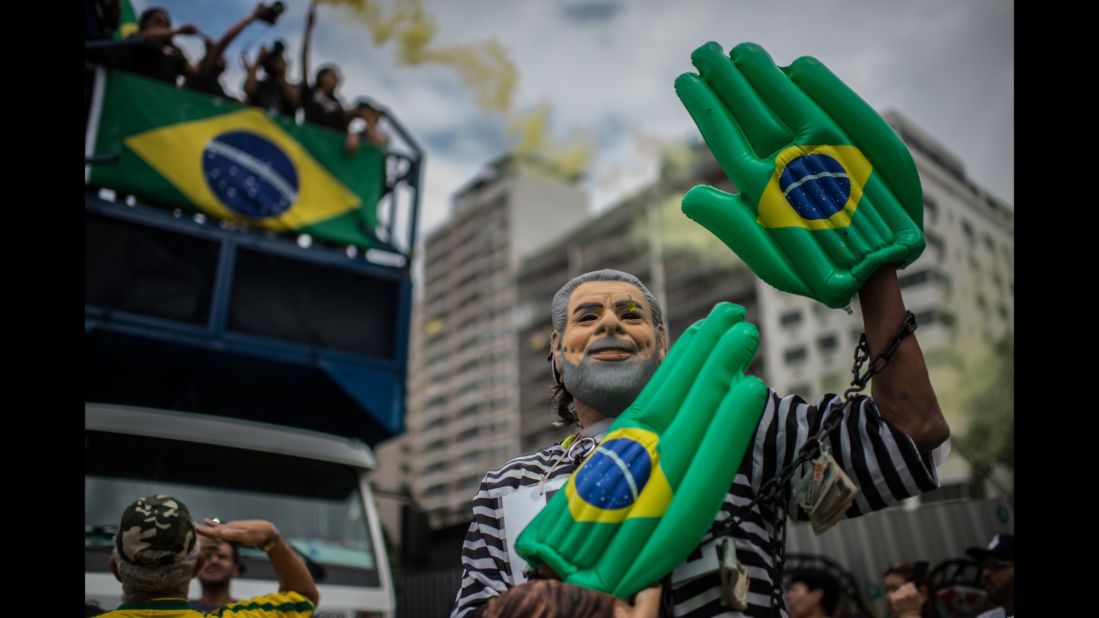 A demonstrator is dressed as Lula Da Silva during a protest in Rio de Janeiro on Sunday, March 13.