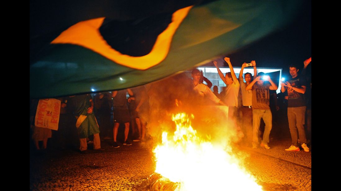 Demonstrators protest in front of the presidential palace on March 16. 