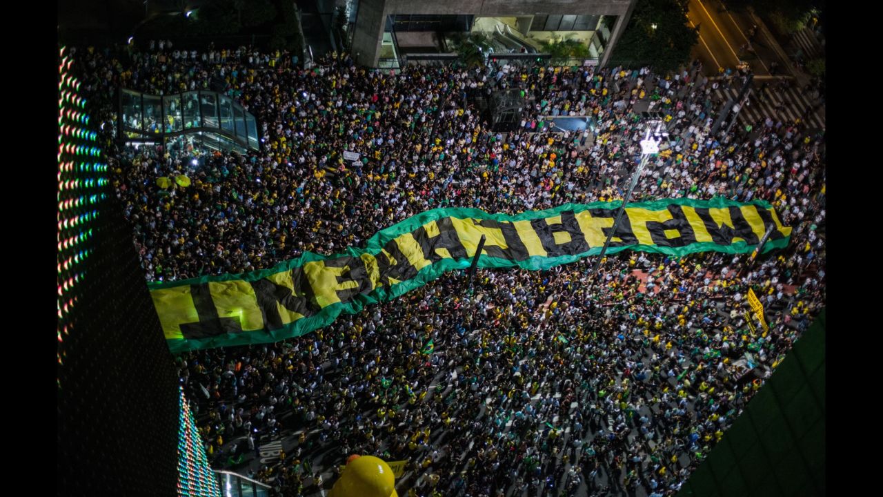 An impeachment sign is carried in Sao Paulo on March 16.