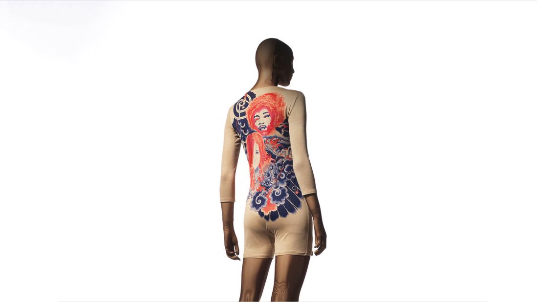This piece from Miyake's first collection features a tattoo print of Janis Joplin and Jimi Hendrix. The image was created by Makiko Minagawa, an artist from his studio.