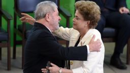 Former Brazilian president Luiz Inacio Lula da Silva (L) hugs Brazilian president Dilma Rousseff during Lula's swear in ceremony as chief of staff, in Brasilia on March 17, 2016. Rousseff appointed Luiz Inacio Lula da Silva as her chief of staff hoping that his political prowess can save her administration. The president is battling an impeachment attempt, a deep recession, and the fallout of an explosive corruption scandal at state oil giant Petrobras.       AFP PHOTO/EVARISTO SA / AFP / EVARISTO SA        (Photo credit should read EVARISTO SA/AFP/Getty Images)