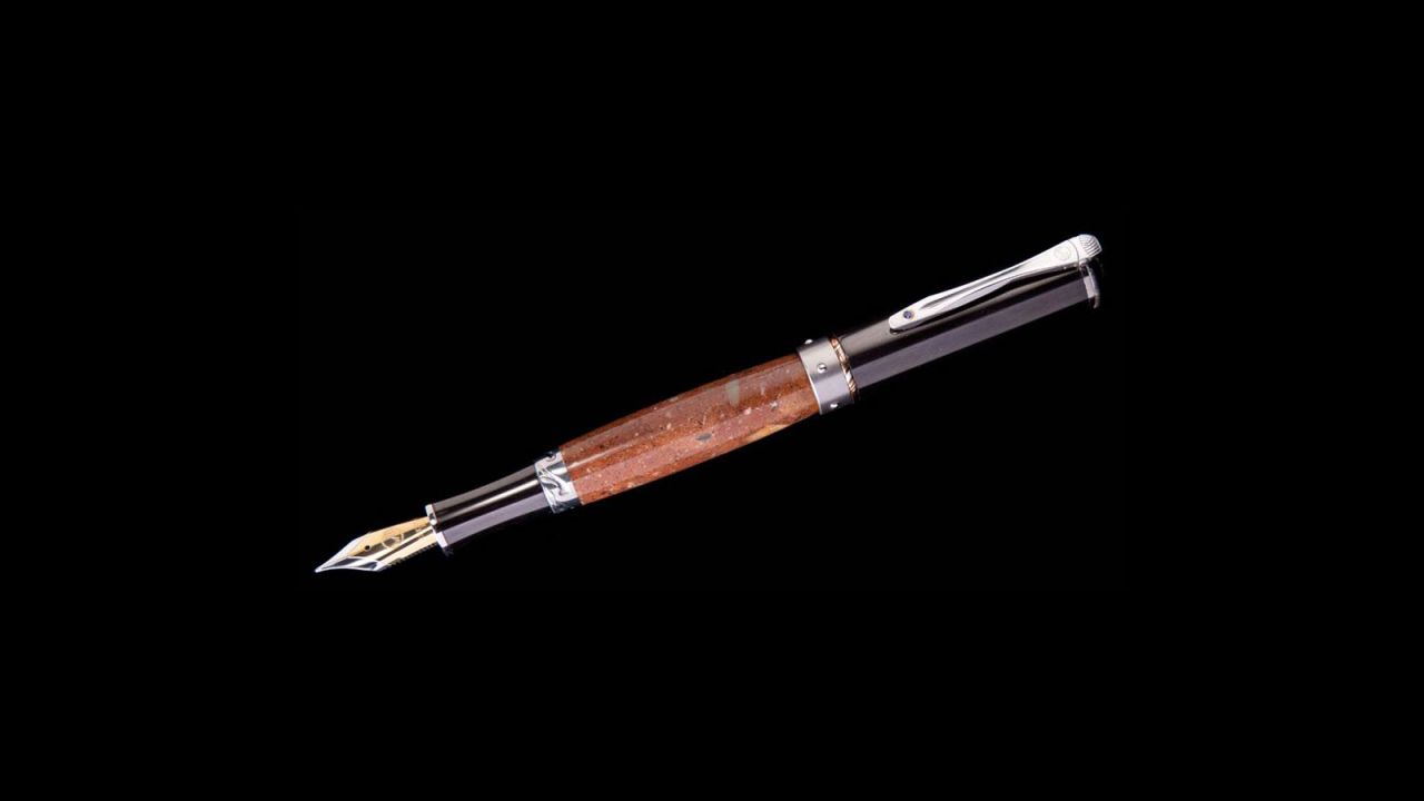 The most unique item used by William Henry to date is a petrified dinosaur egg, used to create this pen. 