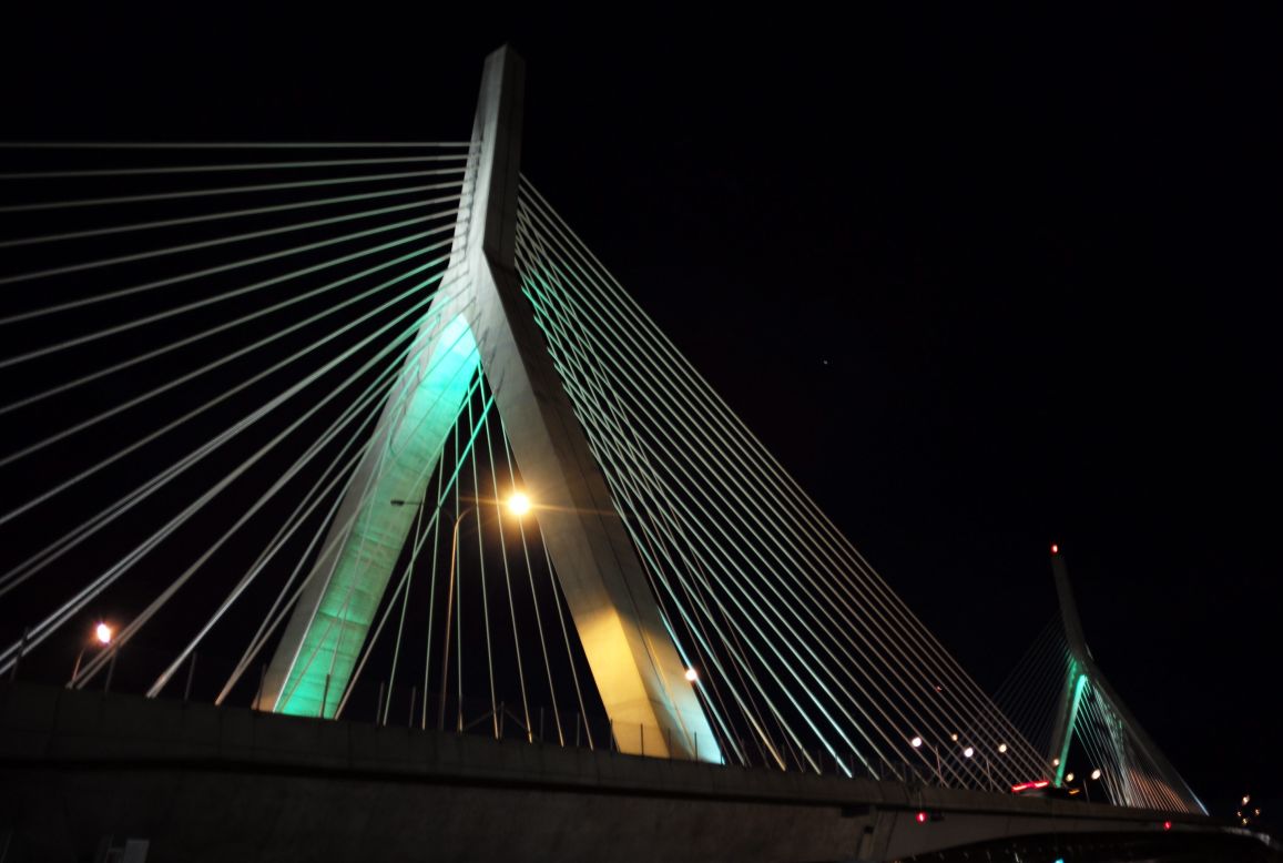 The Leonard P. Zakim Bunker Hill Memorial Bridge is lit green in honor of St Patrick's Day in Boston on Thursday, March 17.