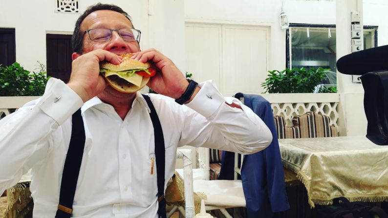 Another local food challenge: In Dubai, Quest sinks his teeth into a camel burger. 