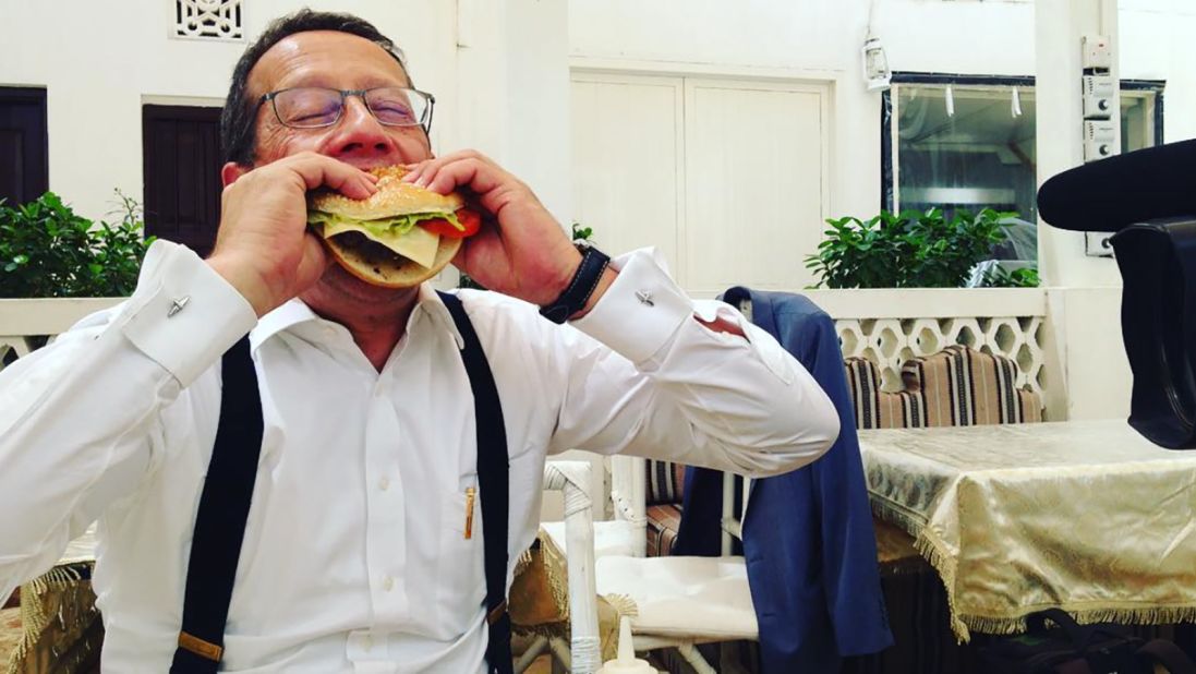 Another local food challenge: In Dubai, Quest sinks his teeth into a camel burger. 