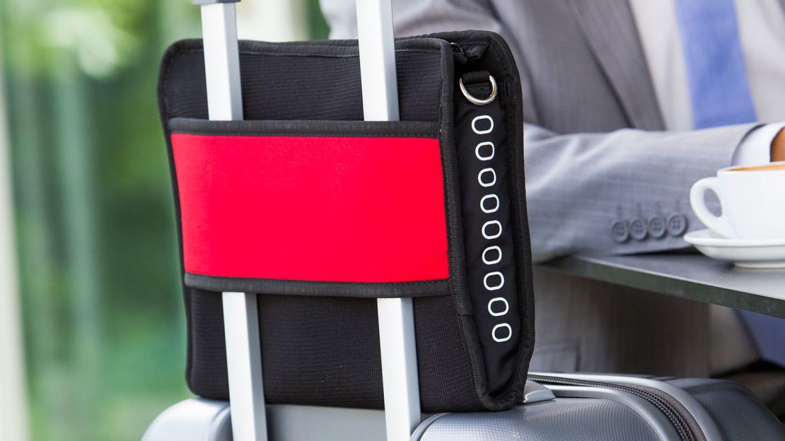 The Airpocket comes with a wide band that can be secured to a suitcase.
