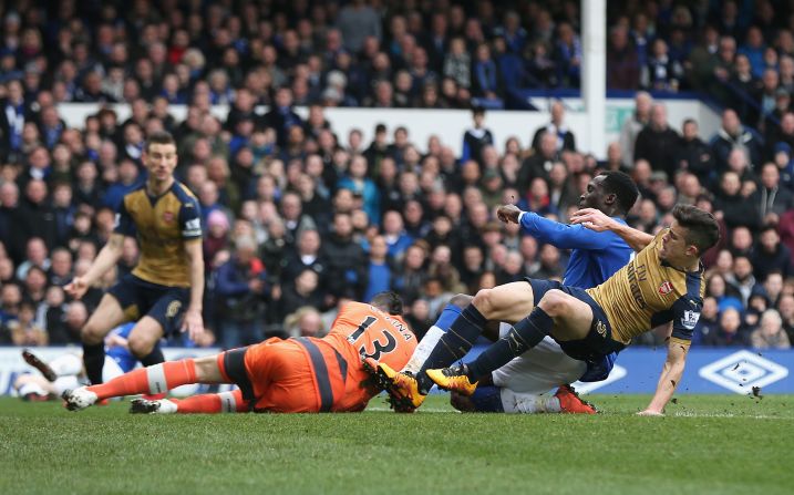 Colombian goalkeeper David Ospina of Arsenal collides with Romelu Lukaku of Everton during the Premier League match between Everton and Arsenal. Though Ospina -- himself a substitute for injured Petr Cech -- remained in the match, he walked off limping after the final whistle. 