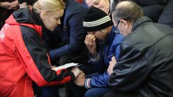 A Russian Emergency Situations Ministry employee, left, tries to comfort a relative of the plane crash victims at the Rostov-on-Don airport, about 950 kilometers (600 miles) south of Moscow, Russia Saturday, March 19, 2016. An airliner coming from Dubai crashed early Saturday while landing in the southern Russian city of Rostov-on-Don, Russias Emergencies Ministry said. (AP Photo)