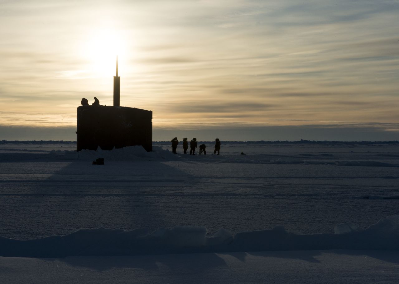 The submarine USS Hampton (SSN 767) surfaces through the Arctic ice on March 14, 2016.