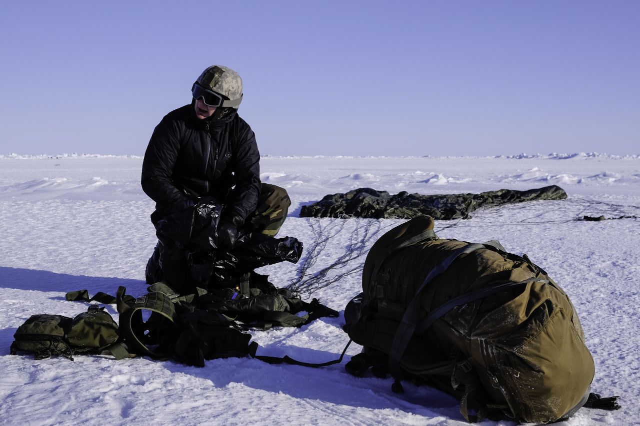 An Army paratrooper parachutes into the Arctic Circle during ICEX 2016.