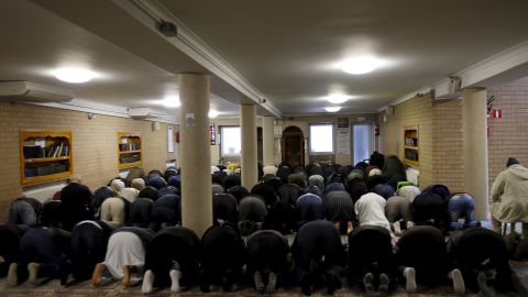 Members of Molenbeek's Muslim community attend Friday prayers at Attadamoun Mosque.