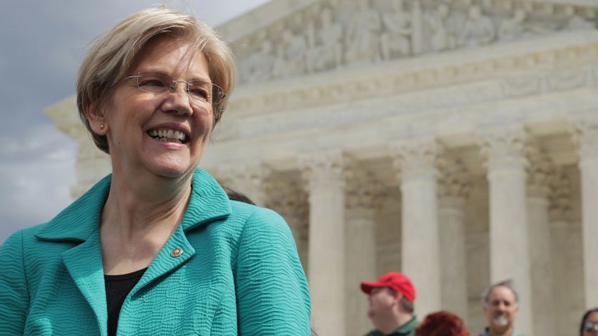 Sen. Elizabeth Warren (D-MA) joins fellow Senate Democrats for a news conference in front of the Supreme Court to call on Senate Majority Leader Mitch McConnell (R-KY) and Republicans to 'Do Your Job' March 17, 2016 in Washington, DC. 