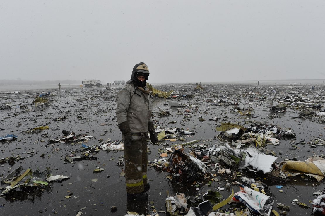 A Russian Emergencies Ministry employee surveys the flydubai wreckage Saturday. 