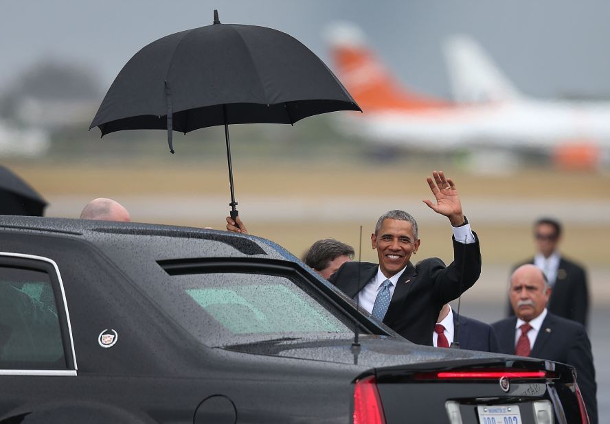 Obama waves shortly after arriving at Jose Marti International Airport.