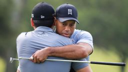 PONTE VEDRA BEACH, FL - MAY 06:  Tiger Woods and Jason Day of Australia embrace during a practice round for THE PLAYERS Championship at the TPC Sawgrass Stadium course on May 6, 2015 in Ponte Vedra Beach, Florida.  (Photo by Sam Greenwood/Getty Images)