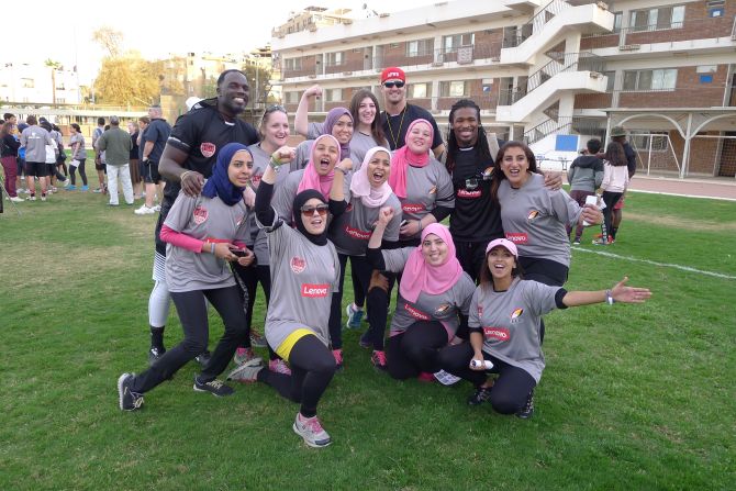 Egypt has two female football teams, the Pink Warriors and the She Wolves. Here, Pink Warriors players pose with their AFWB visitors.