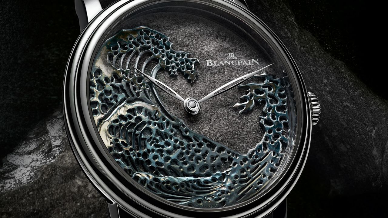 Blancpain's The Great Wave uses silver obsidian for the first time on a base of Shakudo, an ancient Japanese alloy given a unique patina by immersion in a bath of rokusho salts.