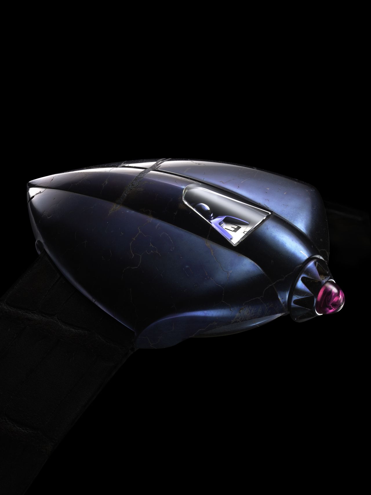 De Bethune's Dream Watch 5, has a unique sculptural design in titanium. The brand, founded in 2002, is a collaboration between famed collector David Zanetta and fourth-generation watchmaker Denis Flageollet. They are know for designs that incorporate both modern and traditional design elements, with an aesthetic that is often celestially inspired.