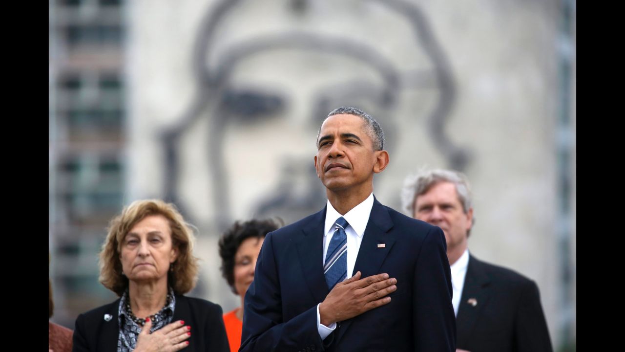 Backdropped by a monument depicting revolutionary hero Che Guevara, Obama listens to the U.S. national anthem during the wreath-laying ceremony on March 21.