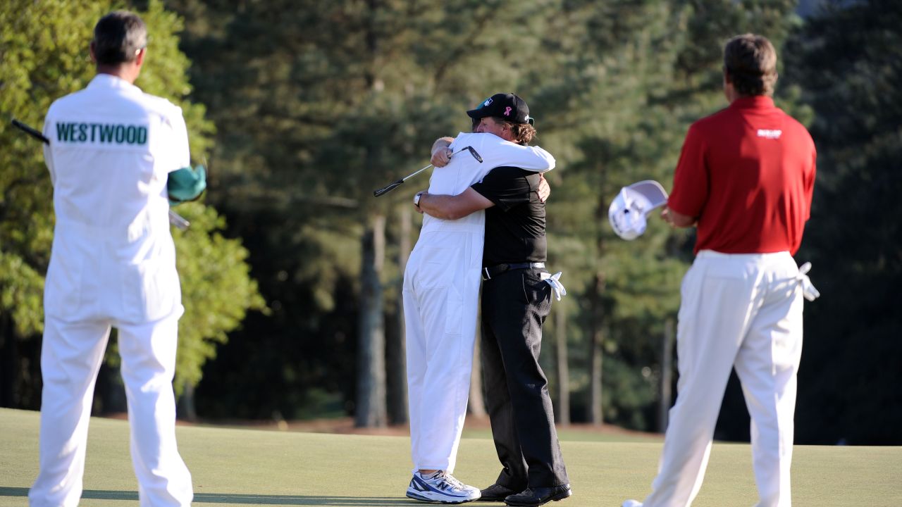 Mickelson won his third green jacket in 2010 as Foster and Westwood look on.