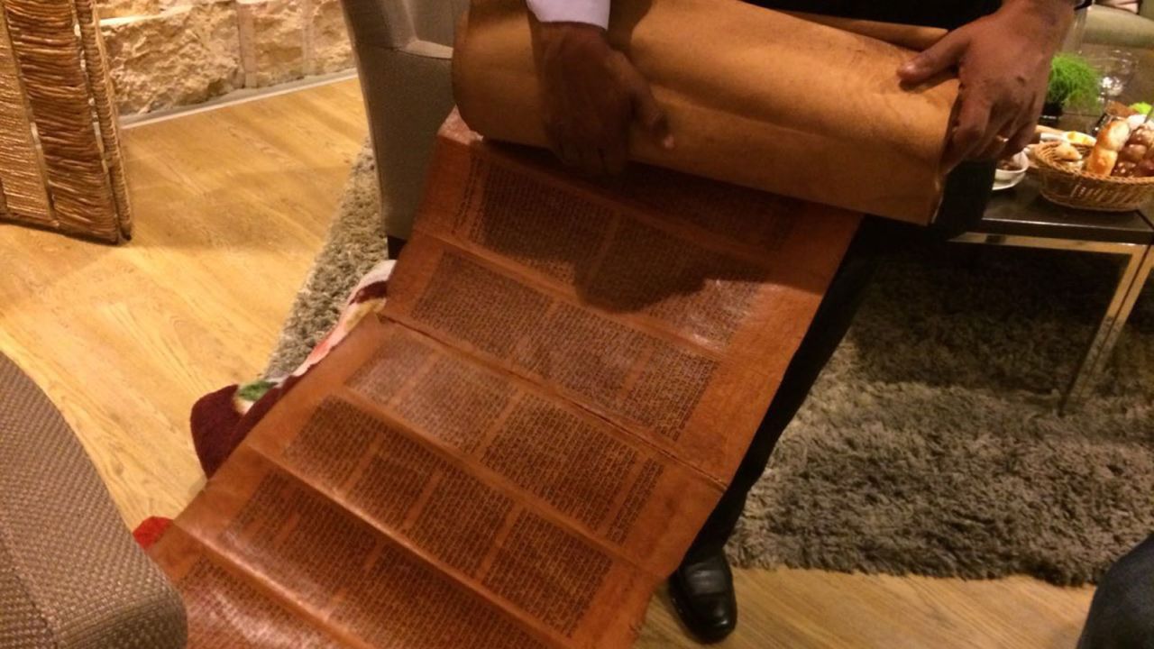 A rabbi making the escape brought a treasured Torah scroll that's hundreds of years old.