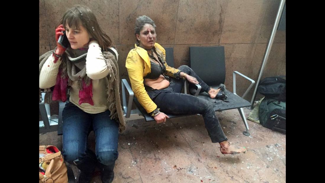 Two wounded women are seen in the airport.