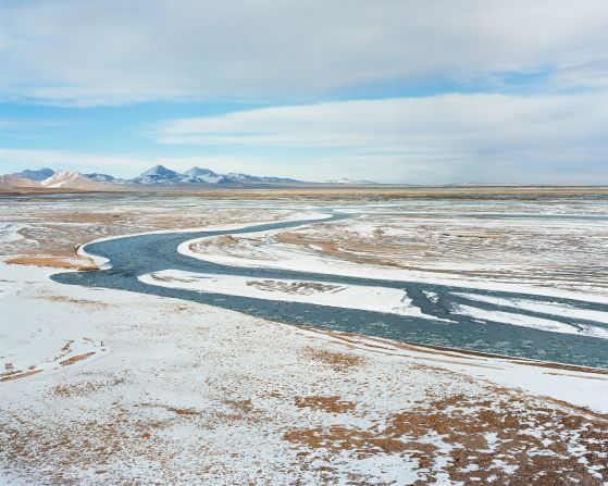 The photographs capture the diverse landscapes as well as the social impact of the river in different areas. 