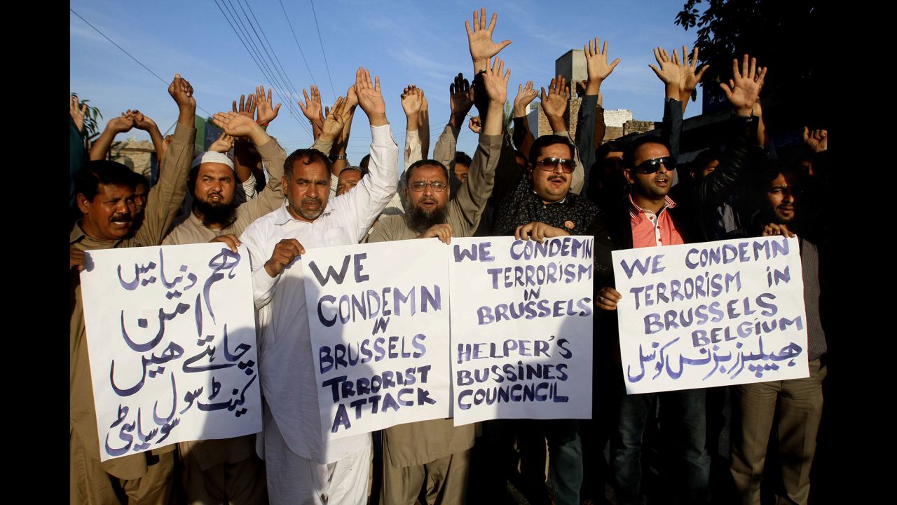 Activists in Multan, Pakistan, condemn the Brussels attack on March 22.