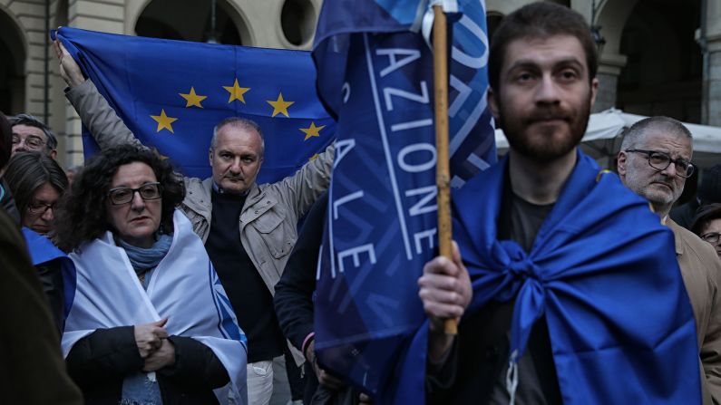 People in Turin, Italy, take part in a rally to remember the victims on March 22.