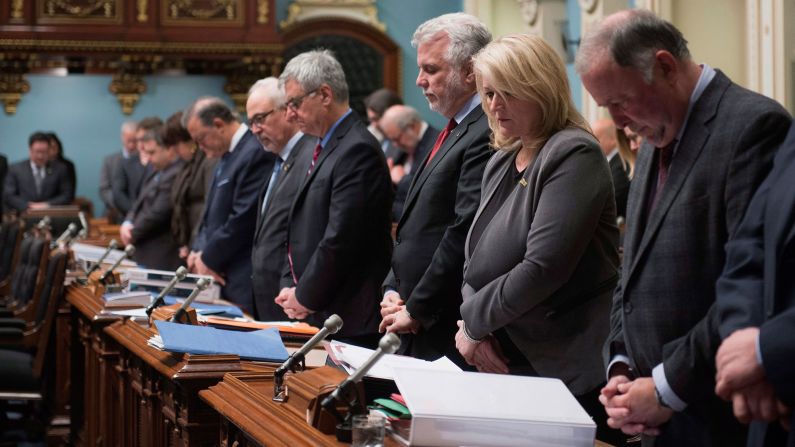 Members of Quebec's National Assembly have a moment of silence on March 22.