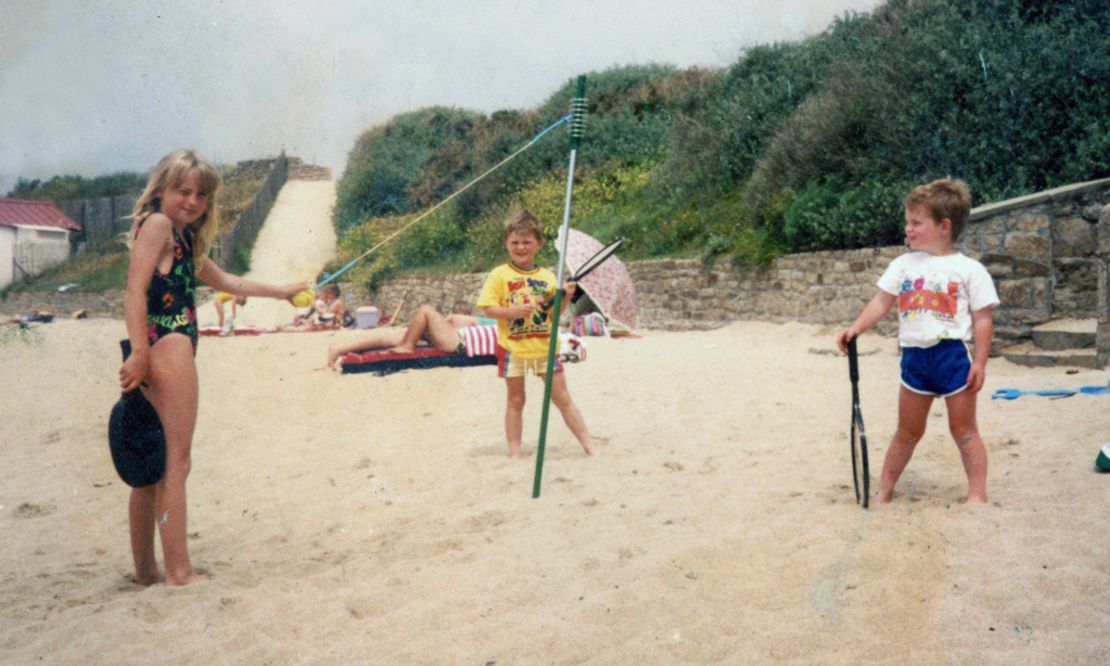 A childhood image of Andy Murray and his brother Jamie playing on the beach.